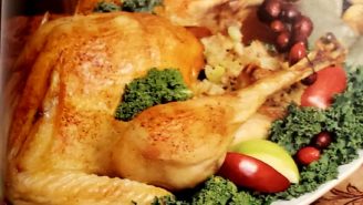 A plate of food with broccoli and apples.