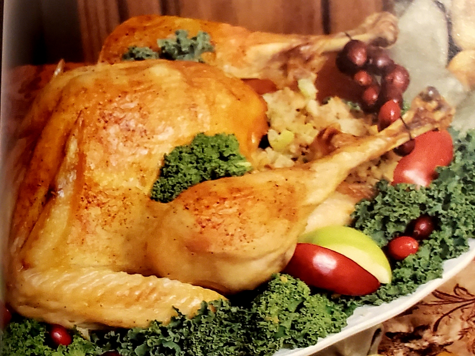 A plate of food with broccoli and apples.