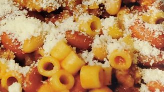 A close up of pasta with sauce and cheese