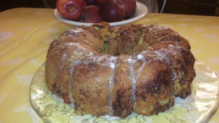 A bundt cake sitting on top of a yellow plate.